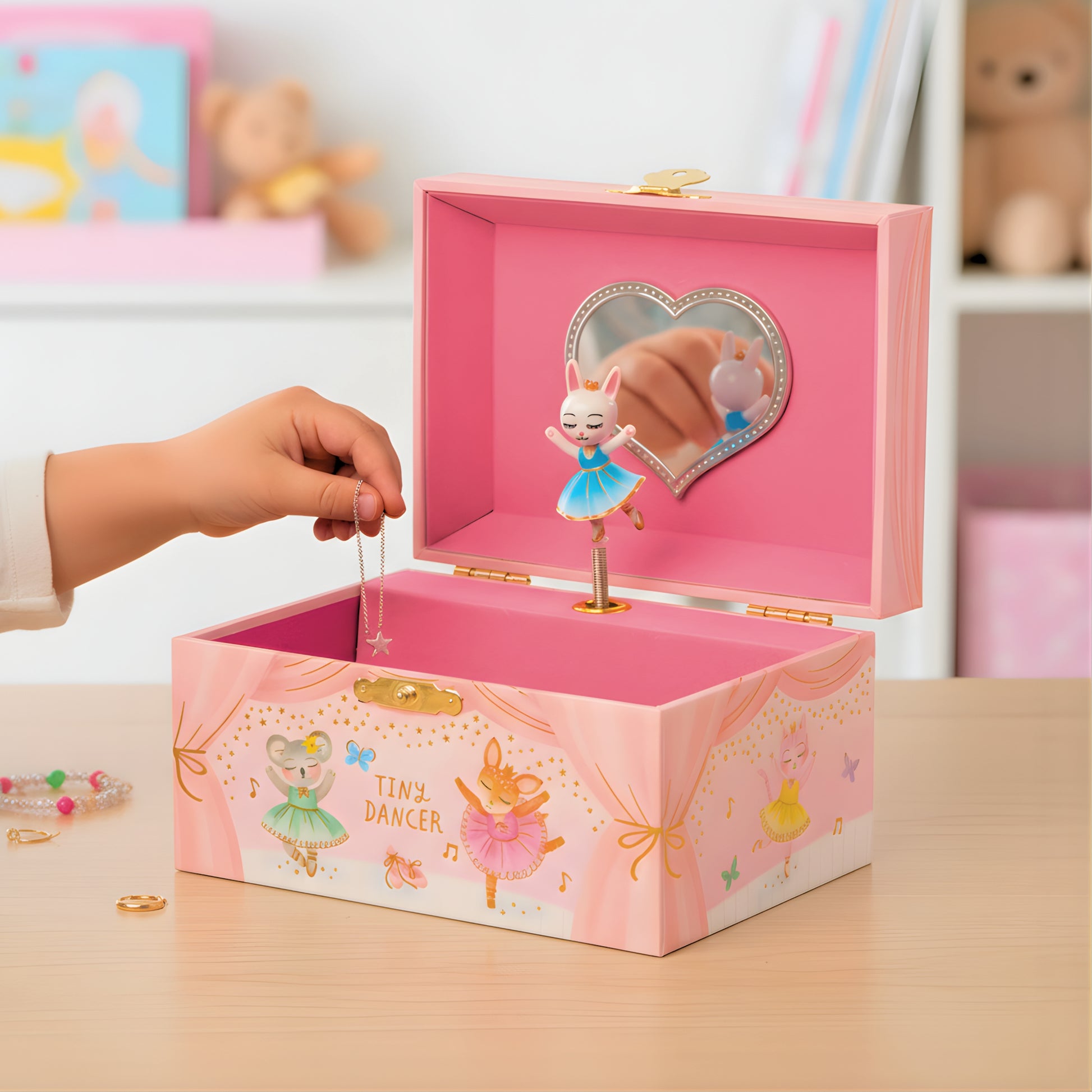 Pink girls jewelry box with a dancing ballerina figure 