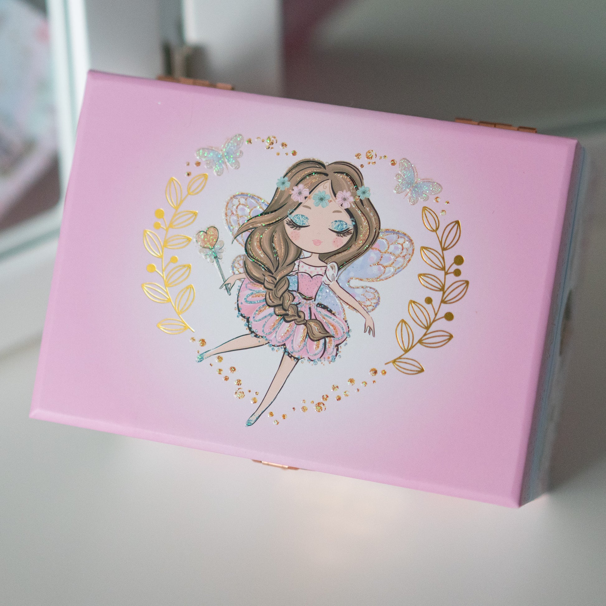 glimmer and shine of foil and sparkles on fairy jewelry box