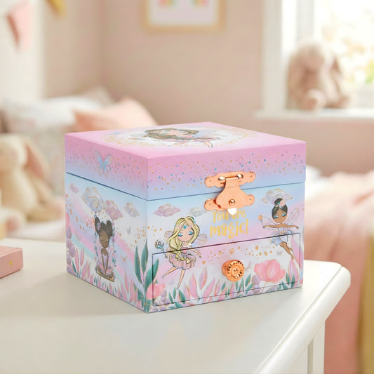 Colorful jewelry box with fairy design on a table